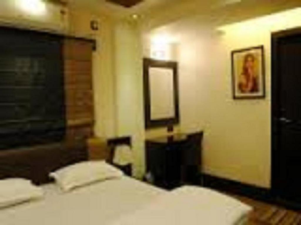 Oyo 1188 Hotel Tangerine Guest House Calcutá Quarto foto